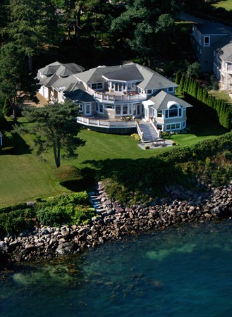 37 Bradlee Road Marblehead, MA 01945 - Photo 1 of 24 a front view of a house with a garden