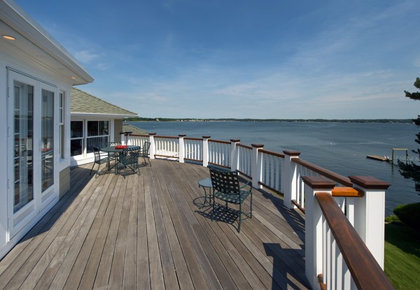 37 Bradlee Road Marblehead, MA 01945 - Photo 17 of 24 a view of a balcony and chairs and wooden floor