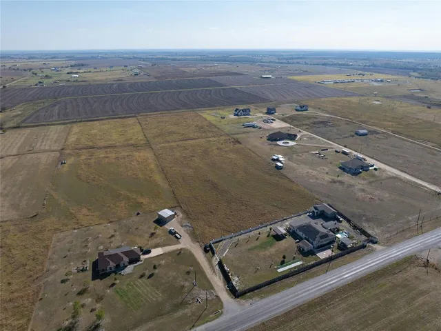 an aerial view of roof with wooden floor
