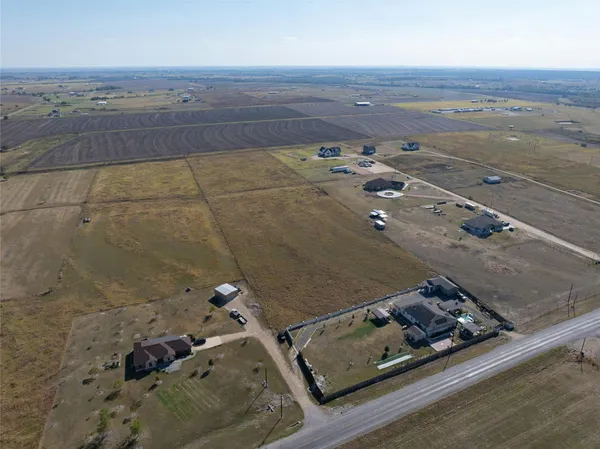 an aerial view of roof with wooden floor