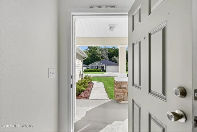 a kitchen with stainless steel appliances granite countertop a refrigerator a stove top oven a sink and dishwasher