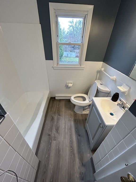 13 Decatur Street, Unit 13 Springfield, MA 01151 - Photo 3 of 7 a bathroom with a toilet sink and mirror