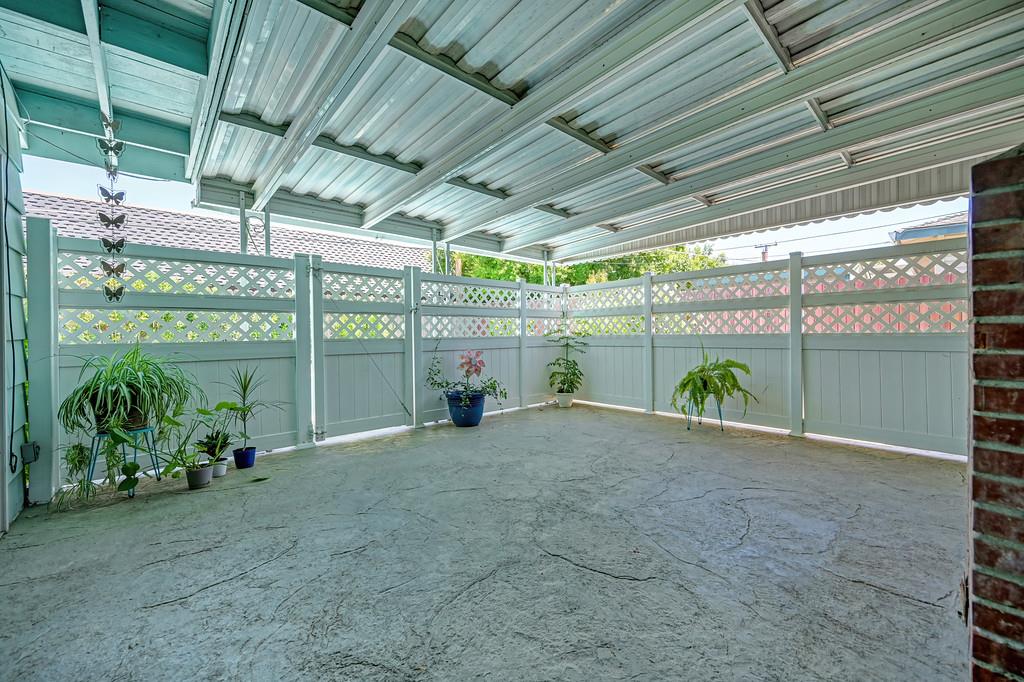 6447 Rexford Way Carmichael, CA 95608 - Photo 28 of 33 Enclosed and covered patio. Gate opens to Pool and Grassy area