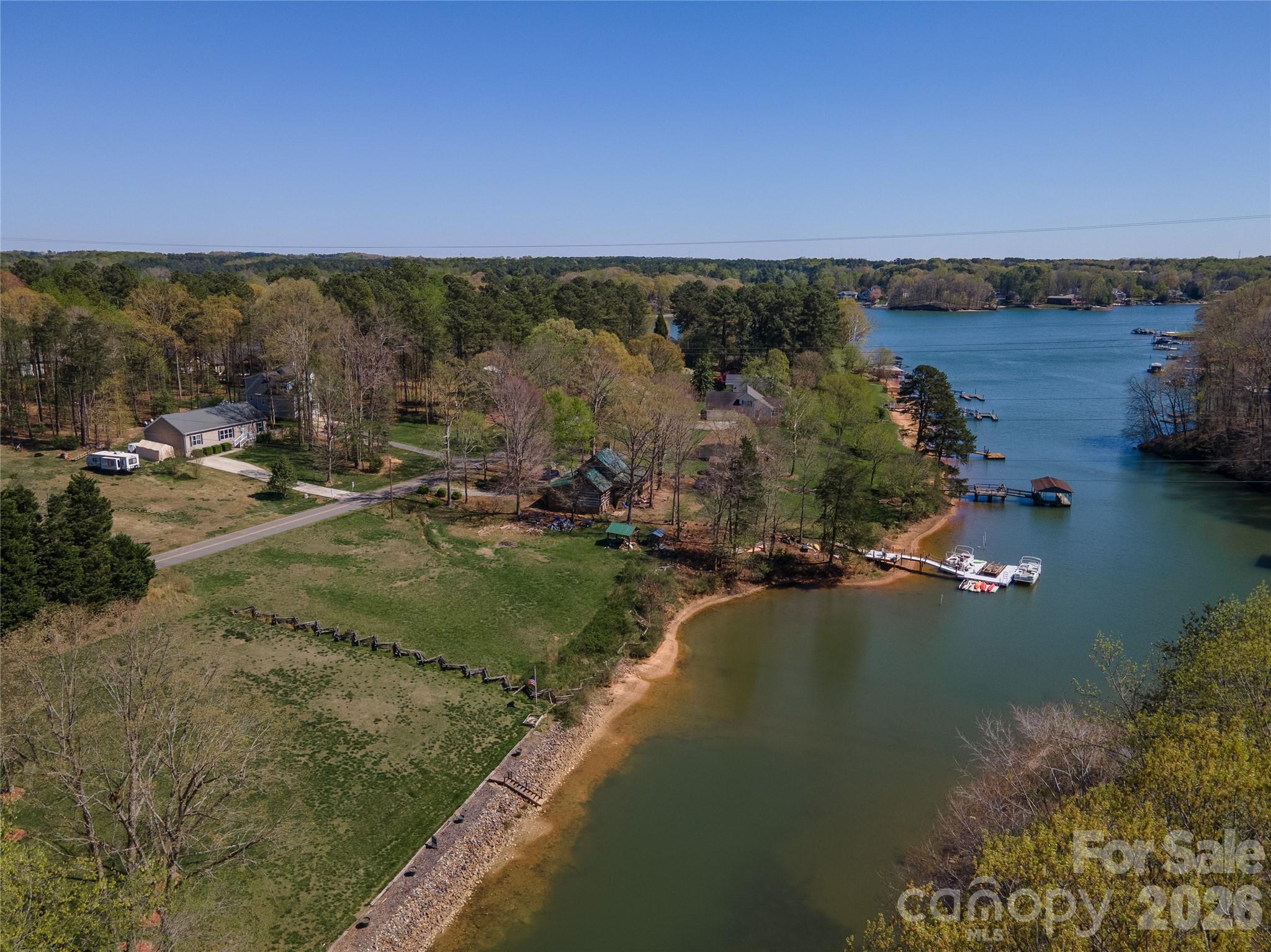 296 Stillwater Road Troutman, NC 28166 - Photo 4 of 33 a view of a lake with a mountain