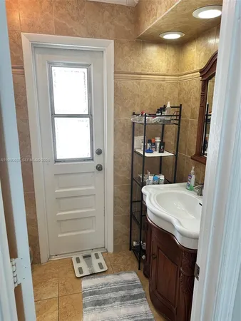 a bathroom with a shower and toilet