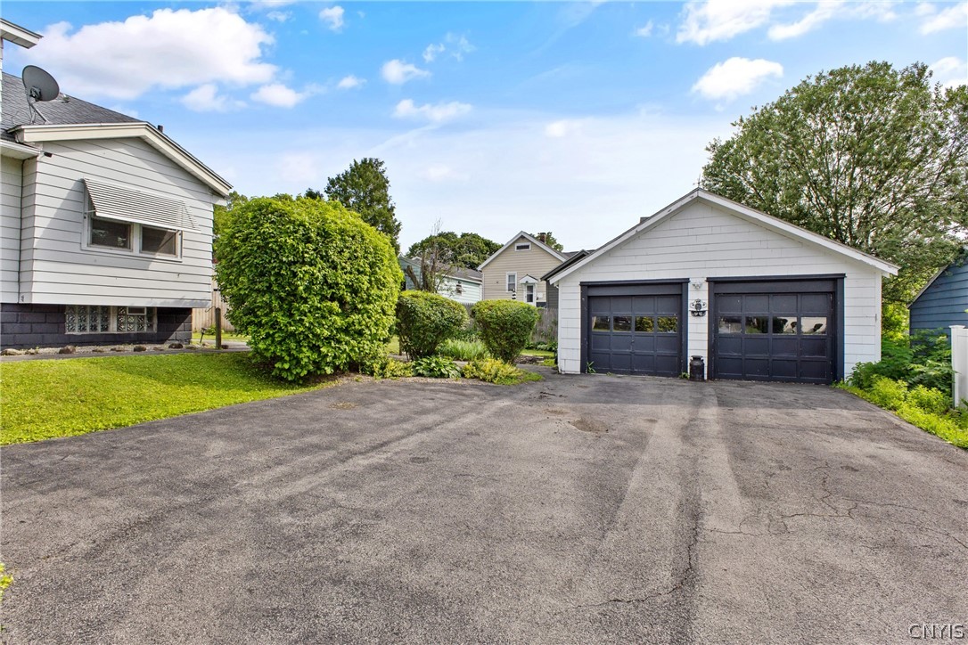 149 Harding Street Syracuse, NY 13208 - Photo 39 of 43 Great shot of the large driveway and detached 2 car garage