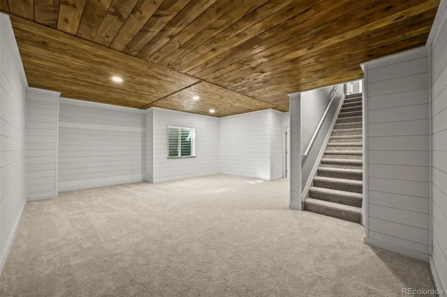 a view of an empty room with a windows