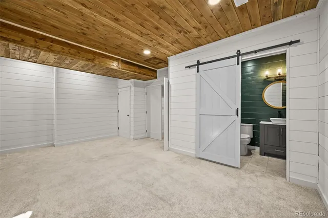 a bathroom with a toilet and a sink