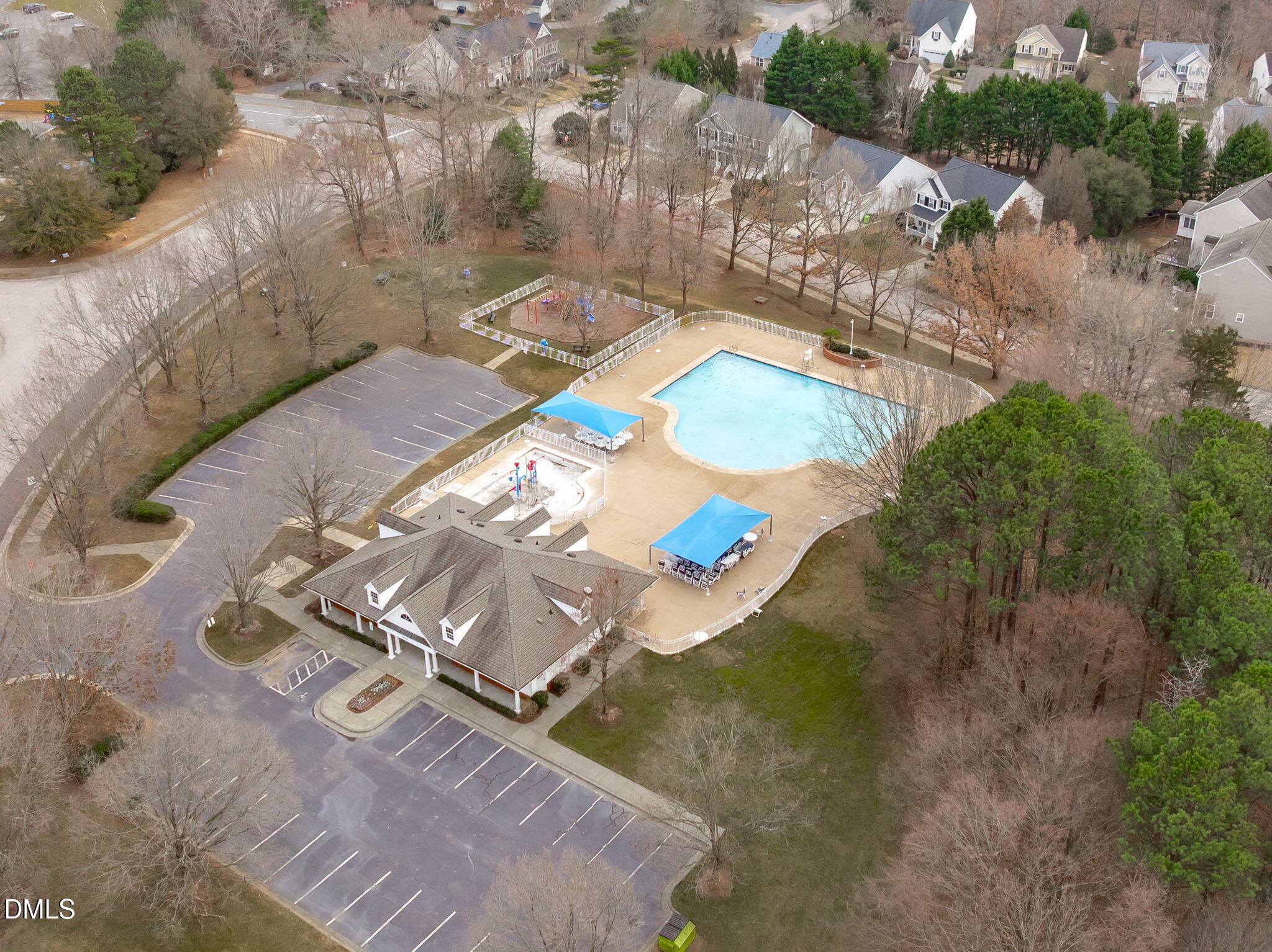 2501 Springfield Park Drive Raleigh, NC 27614 - Photo 42 of 44 a view of a swimming pool with a yard