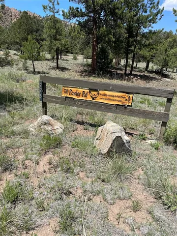 a view of a swimming pool with a bench
