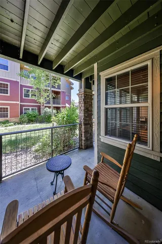 a view of a two chairs in the deck