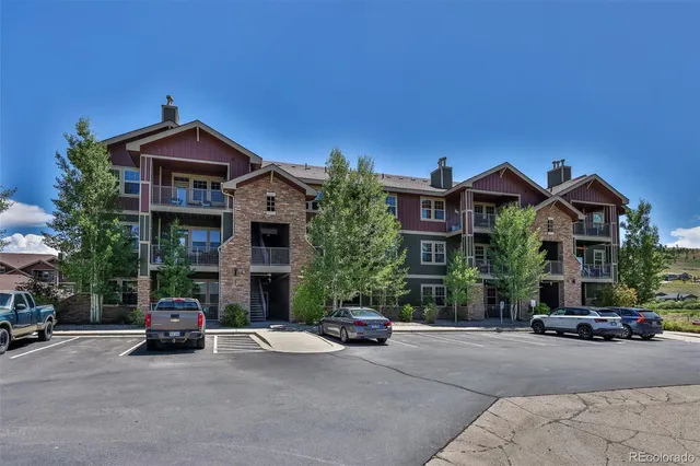 a view of a car parked in front of a house