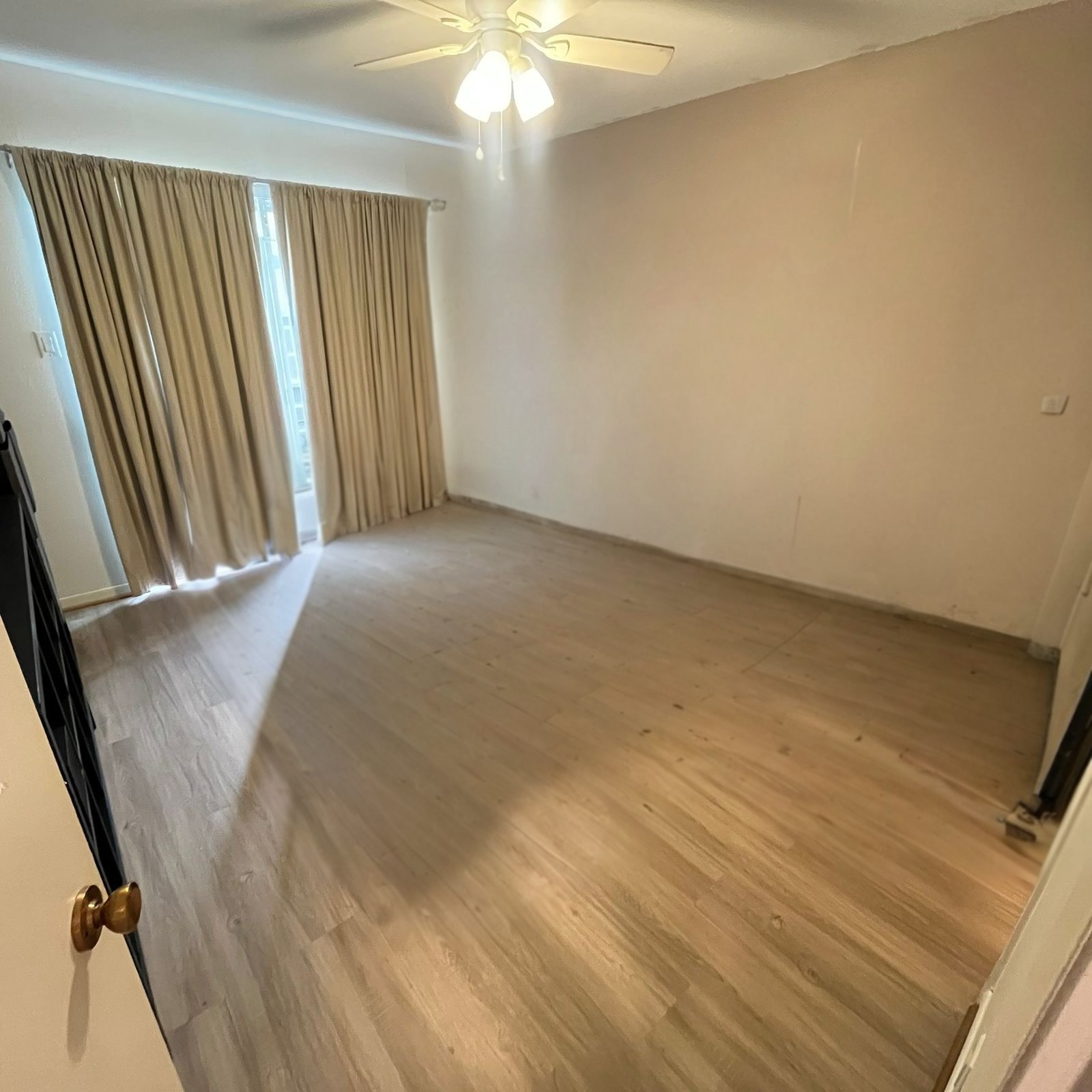 515 Tallowood Road, Unit 55 Houston, TX 77024 - Photo 11 of 18 an empty room with windows
