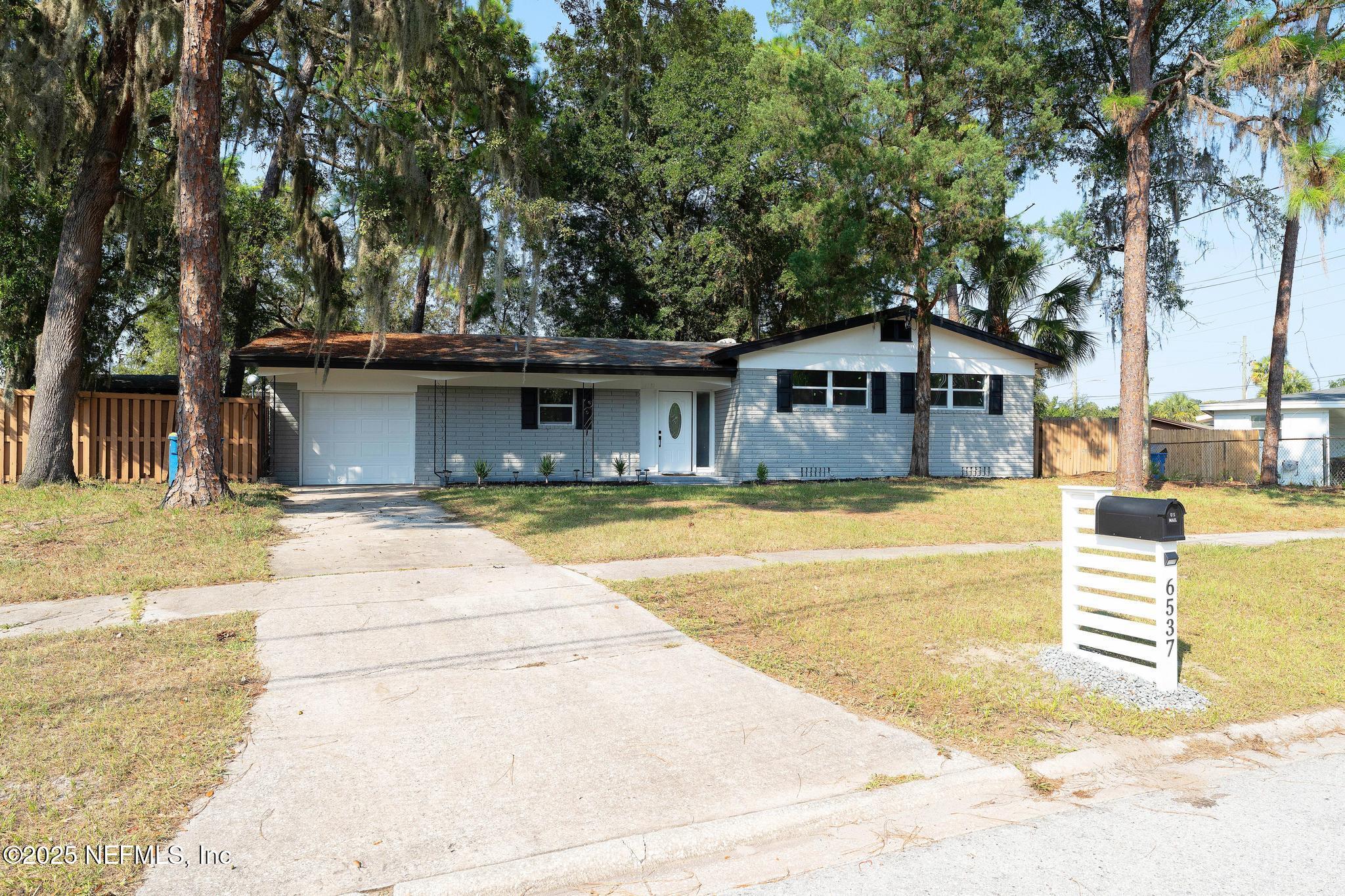 a house view with a outdoor space