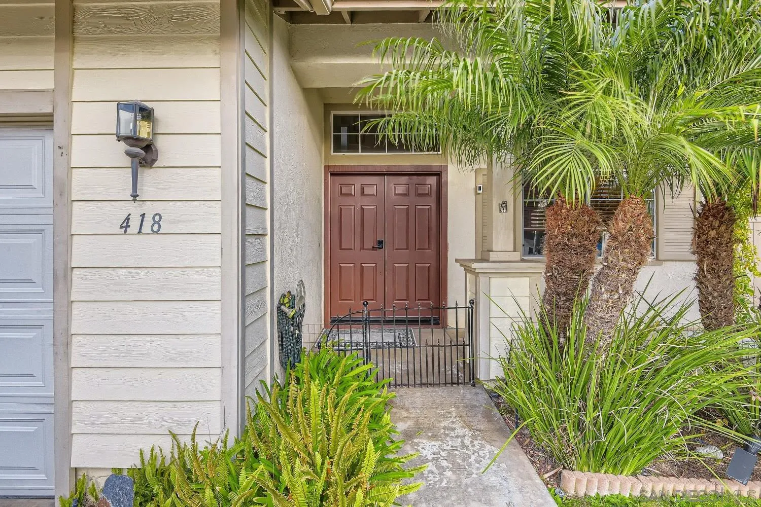 418 Helix Way Oceanside, CA 92057 - Photo 2 of 22 a view of a potted plants with sky view