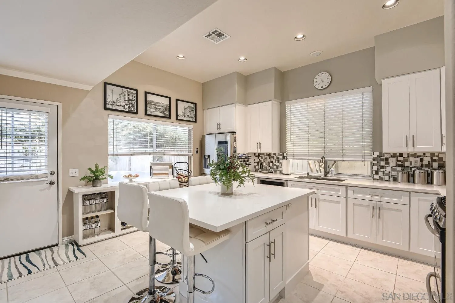 418 Helix Way Oceanside, CA 92057 - Photo 5 of 22 a kitchen with a sink stove and cabinets