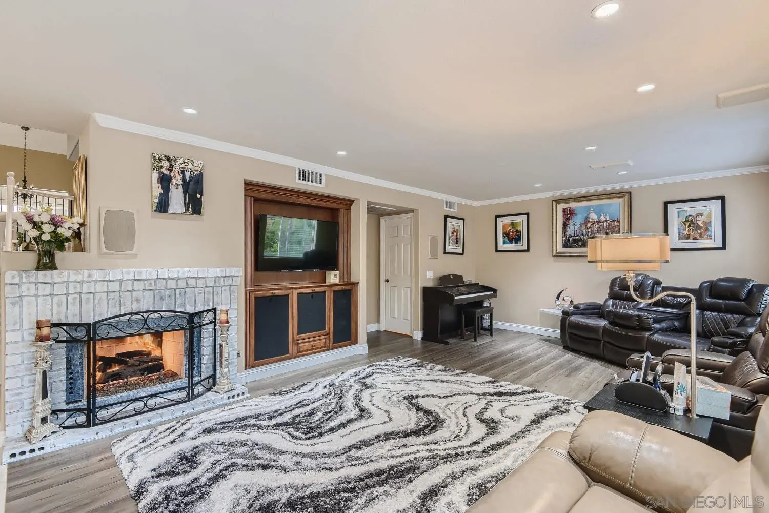 418 Helix Way Oceanside, CA 92057 - Photo 9 of 22 a living room with furniture and a fireplace