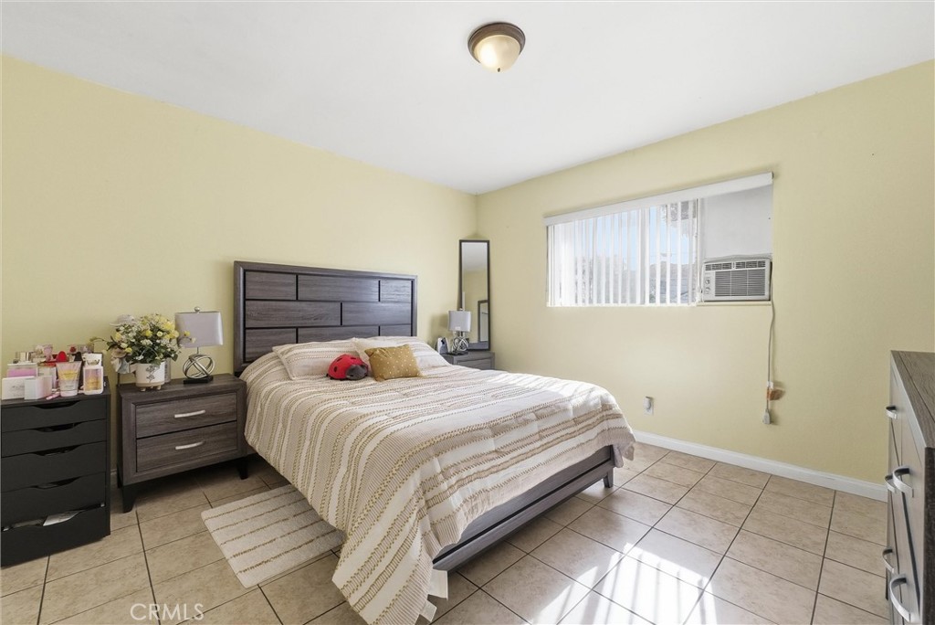 16716 East Renwick Road Azusa, CA 91702 - Photo 21 of 31 a bedroom with a bed and a dresser