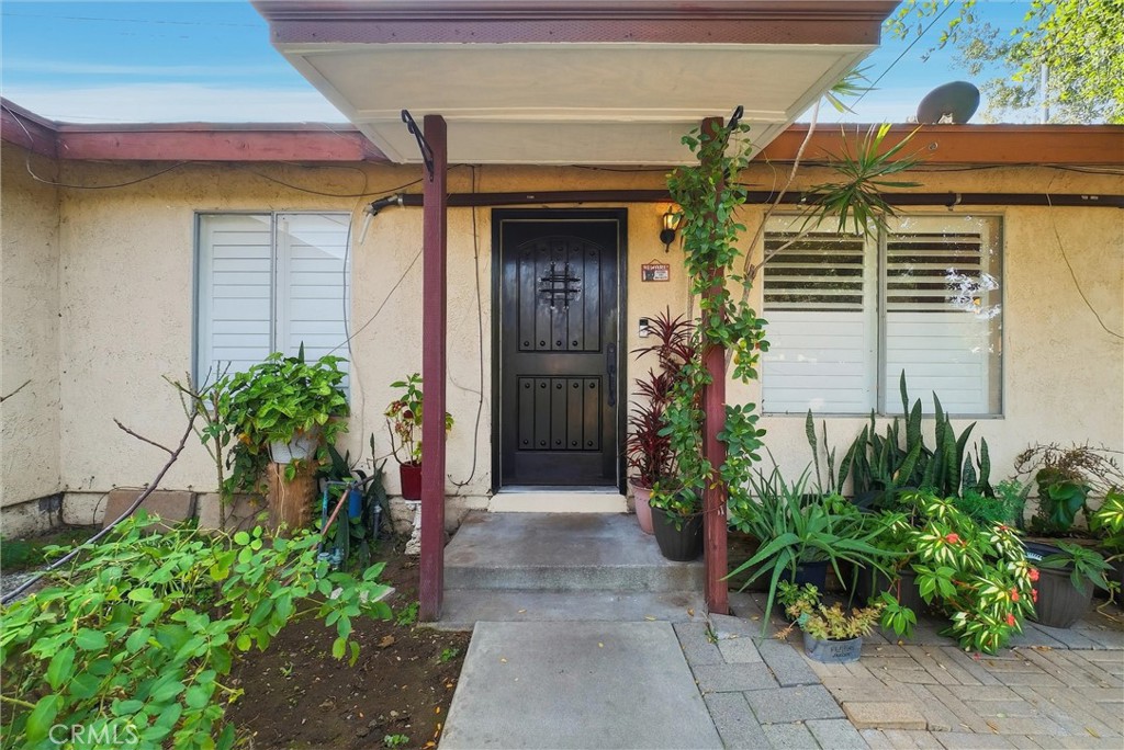 16716 East Renwick Road Azusa, CA 91702 - Photo 3 of 31 a front view of a house with a yard