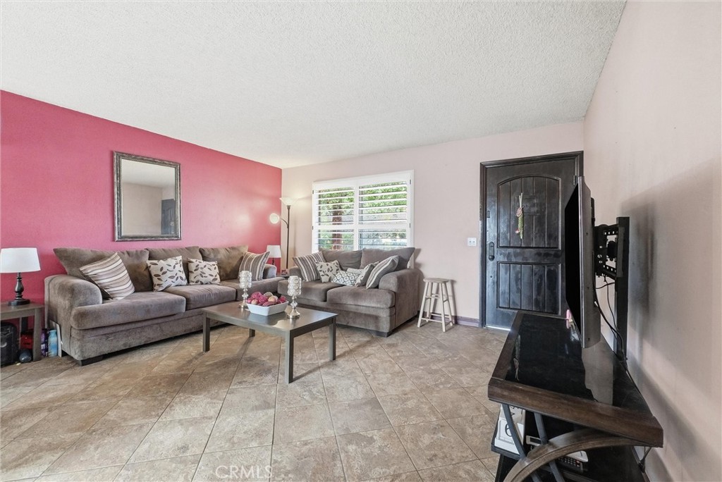 16716 East Renwick Road Azusa, CA 91702 - Photo 8 of 31 a living room with furniture and a window