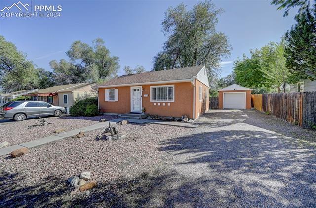 507 East Cheyenne Road Colorado Springs, CO 80905 - Photo 3 of 25 View of front of house with an outbuilding and a garage