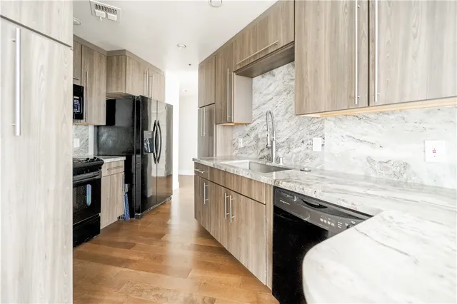 an aerial view of a city with streets and houses