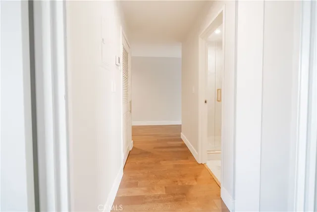a bathroom with a sink vanity mirror and toilet