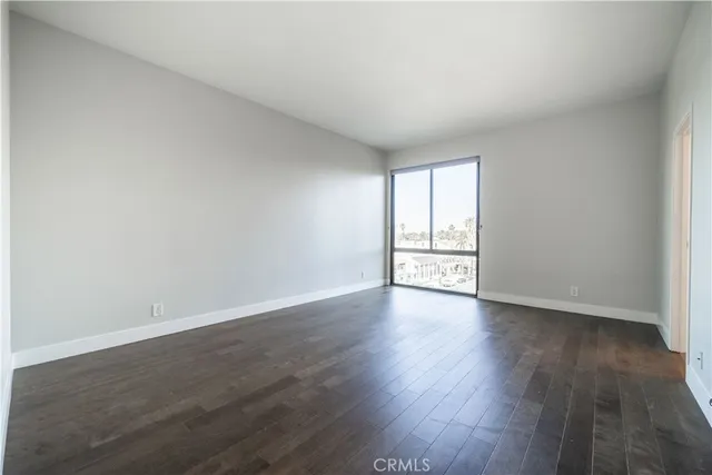 a view of swimming pool with outdoor seating and plants