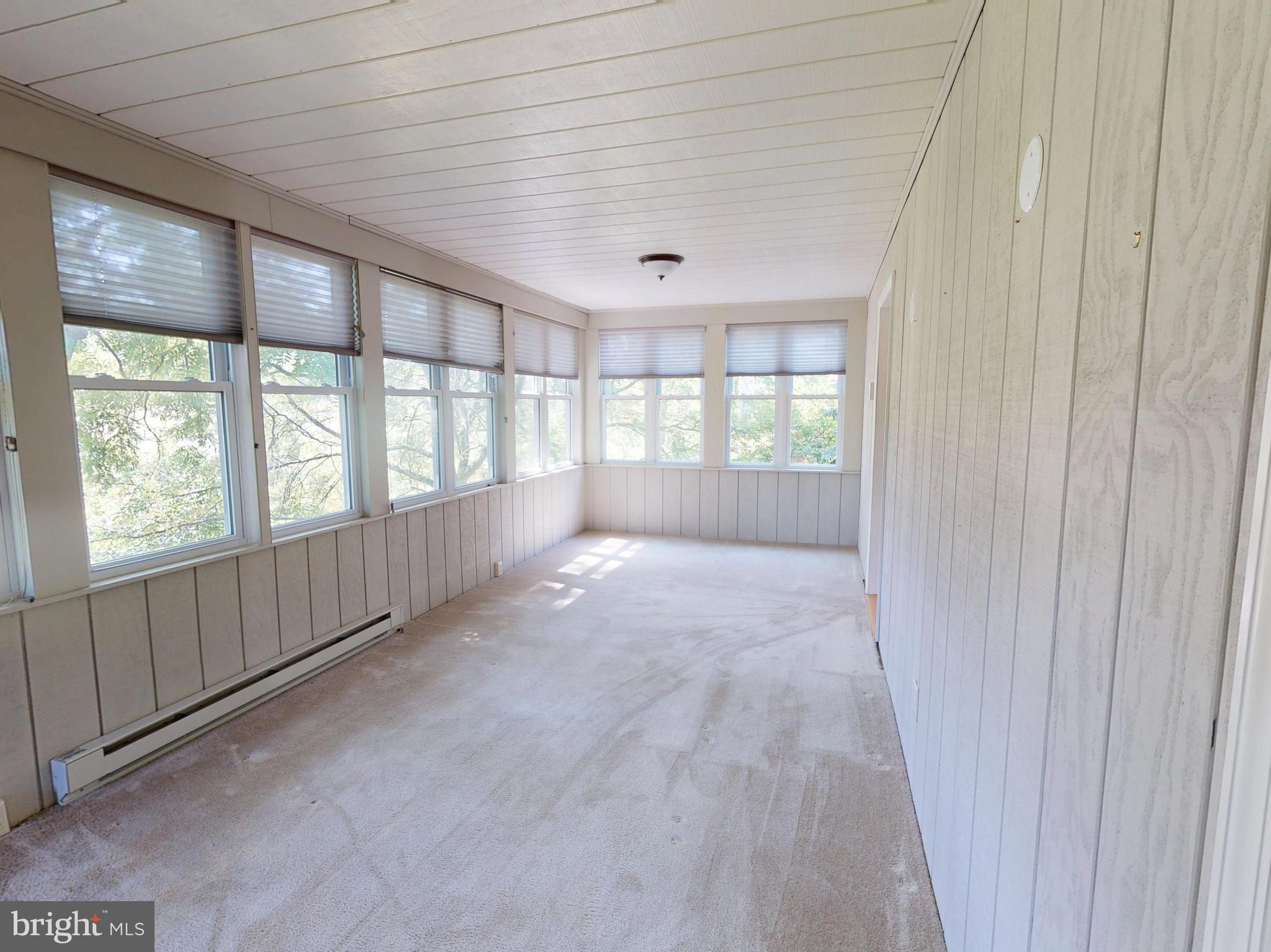 128 Colonial Court State College, PA 16801 - Photo 16 of 39 a view of an empty room with a window