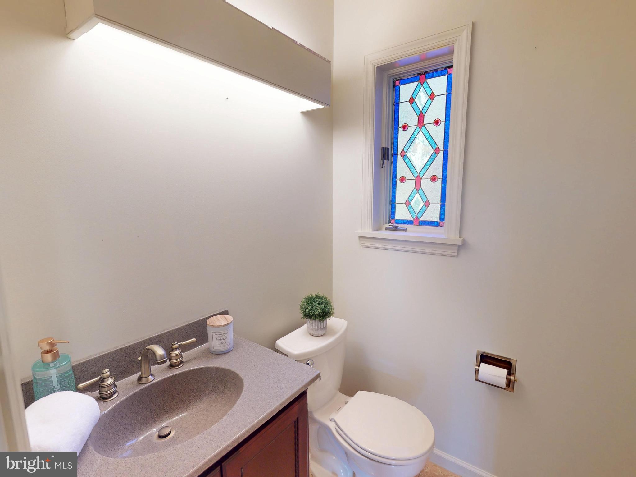 128 Colonial Court State College, PA 16801 - Photo 24 of 39 a bathroom with a sink vanity mirror and toilet