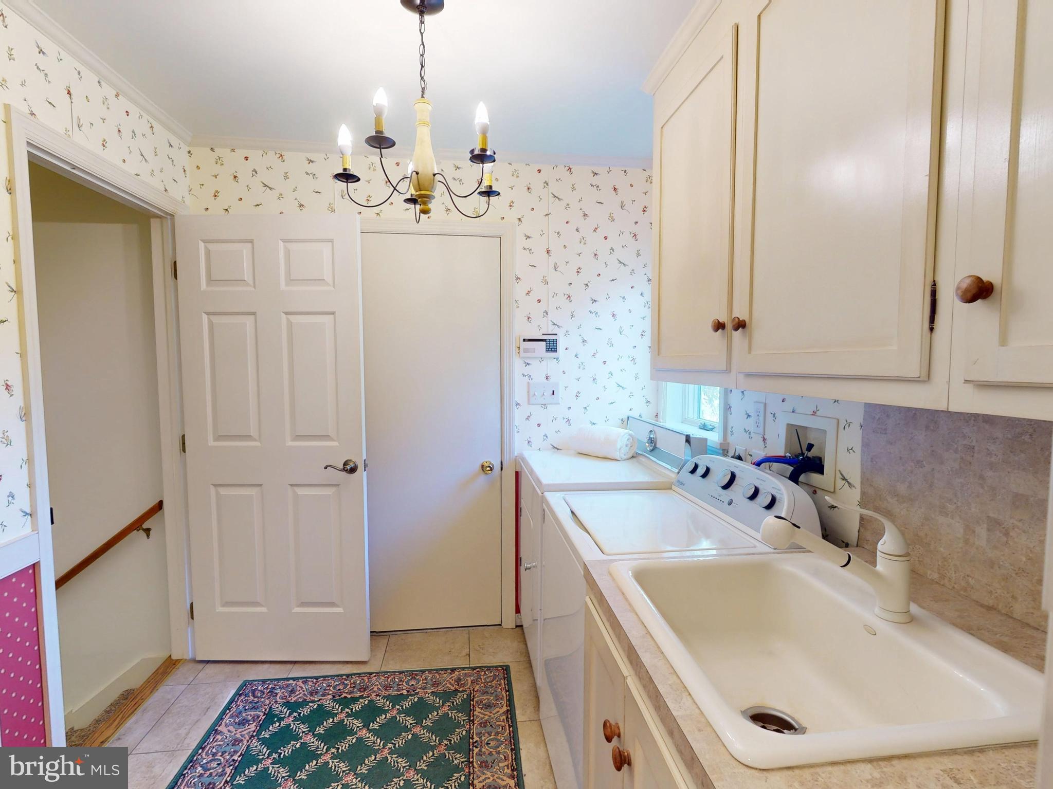 128 Colonial Court State College, PA 16801 - Photo 25 of 39 a bathroom with a sink double vanity and a mirror