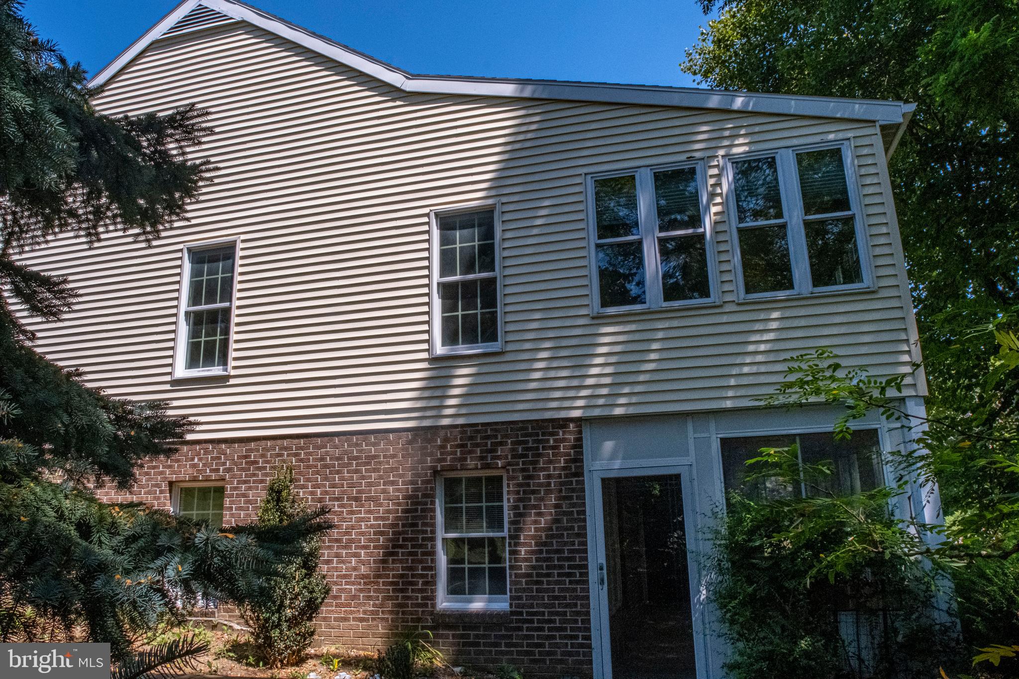 128 Colonial Court State College, PA 16801 - Photo 35 of 39 a front view of a house with plants