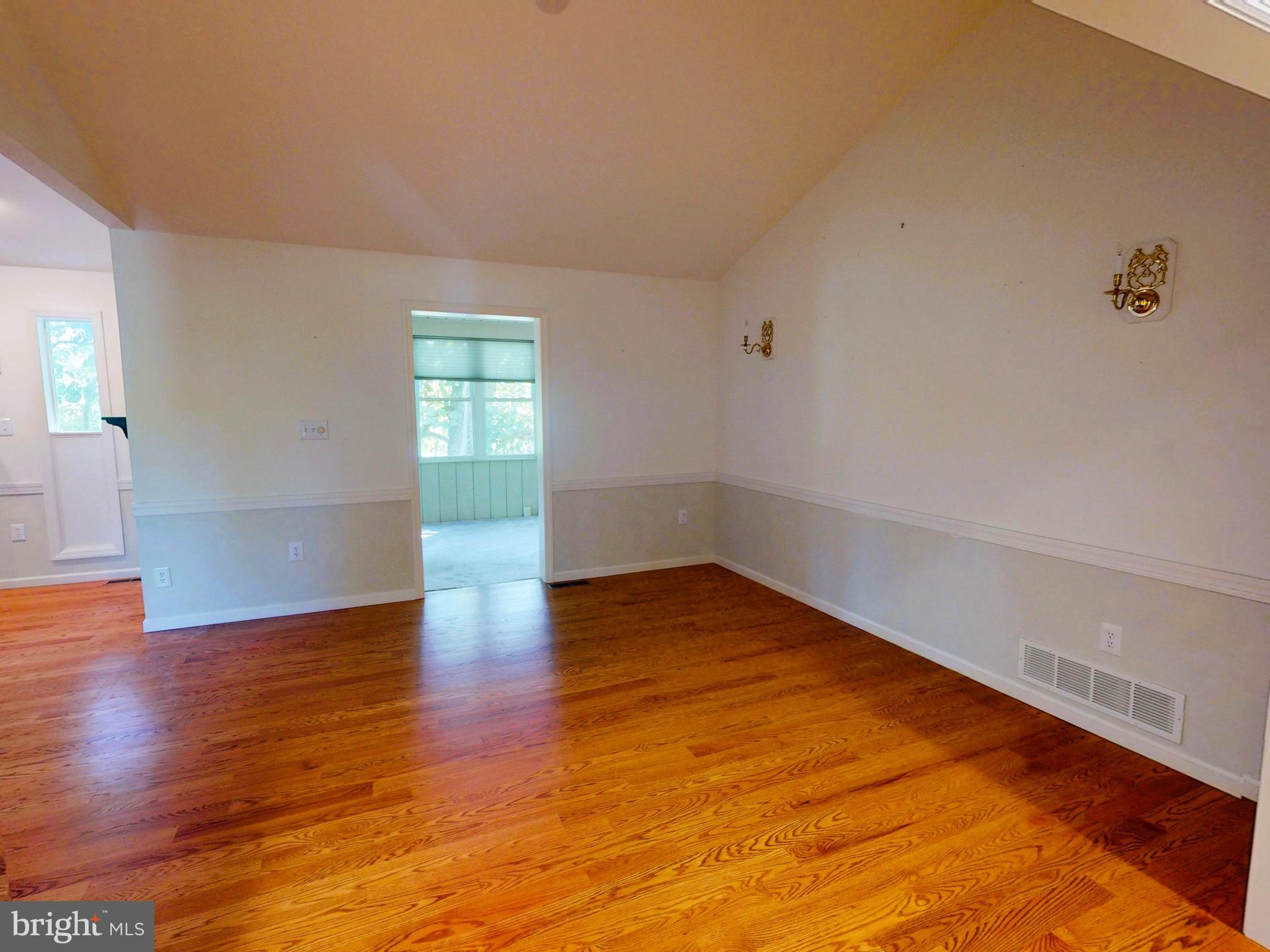 128 Colonial Court State College, PA 16801 - Photo 6 of 39 wooden floor in an empty room with a window