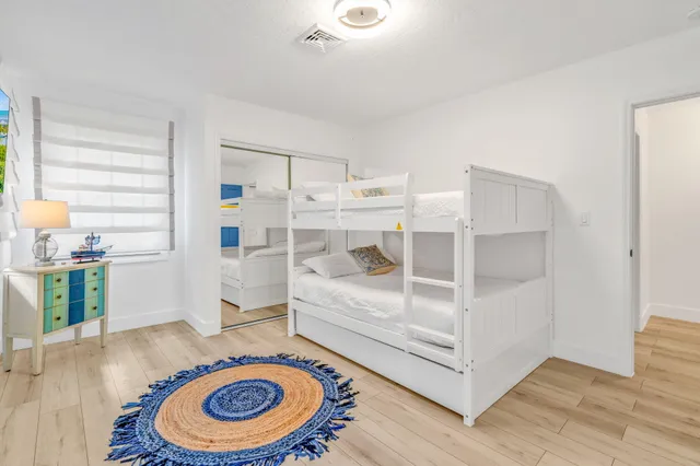 a room with furniture and a wooden floor