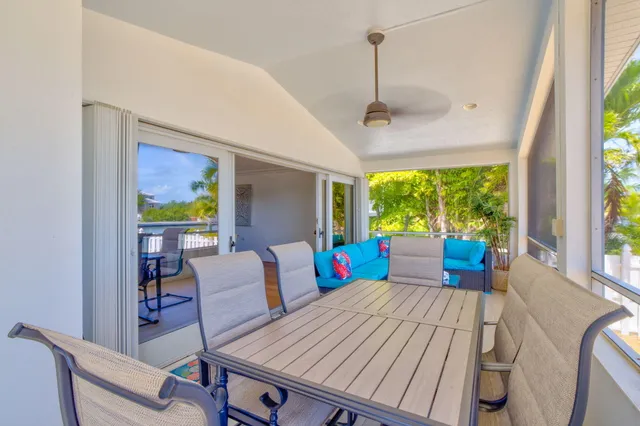 a bed room with furniture and a window