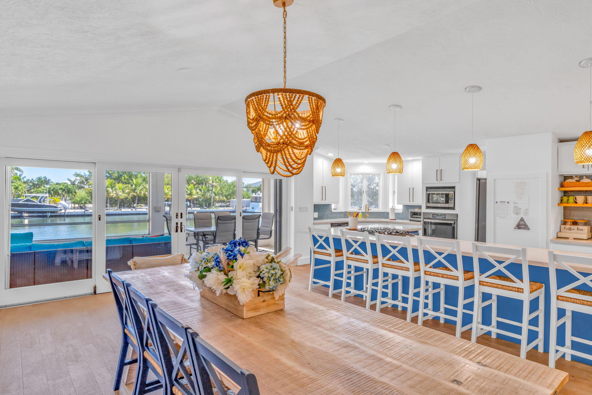 90 B Sombrero Beach Road Marathon, FL 33050 - Photo 6 of 32 a dining room with furniture and a floor to ceiling window