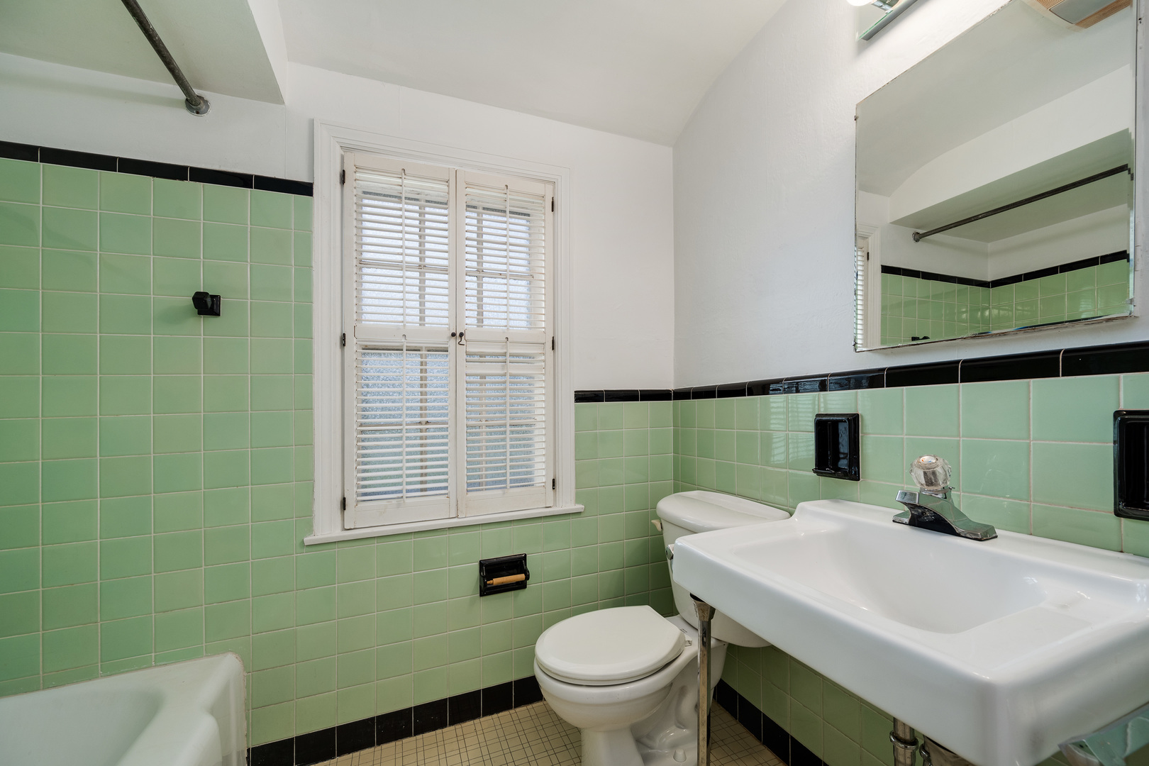 2104 Linneman Street Glenview, IL 60025 - Photo 11 of 19 a bathroom with a sink toilet and shower