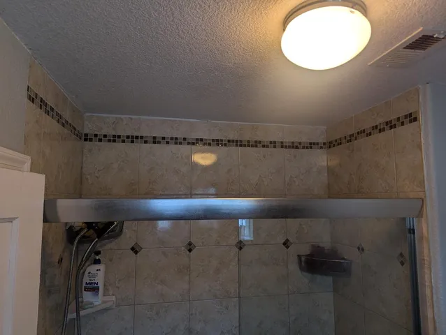 a close view of shower tap