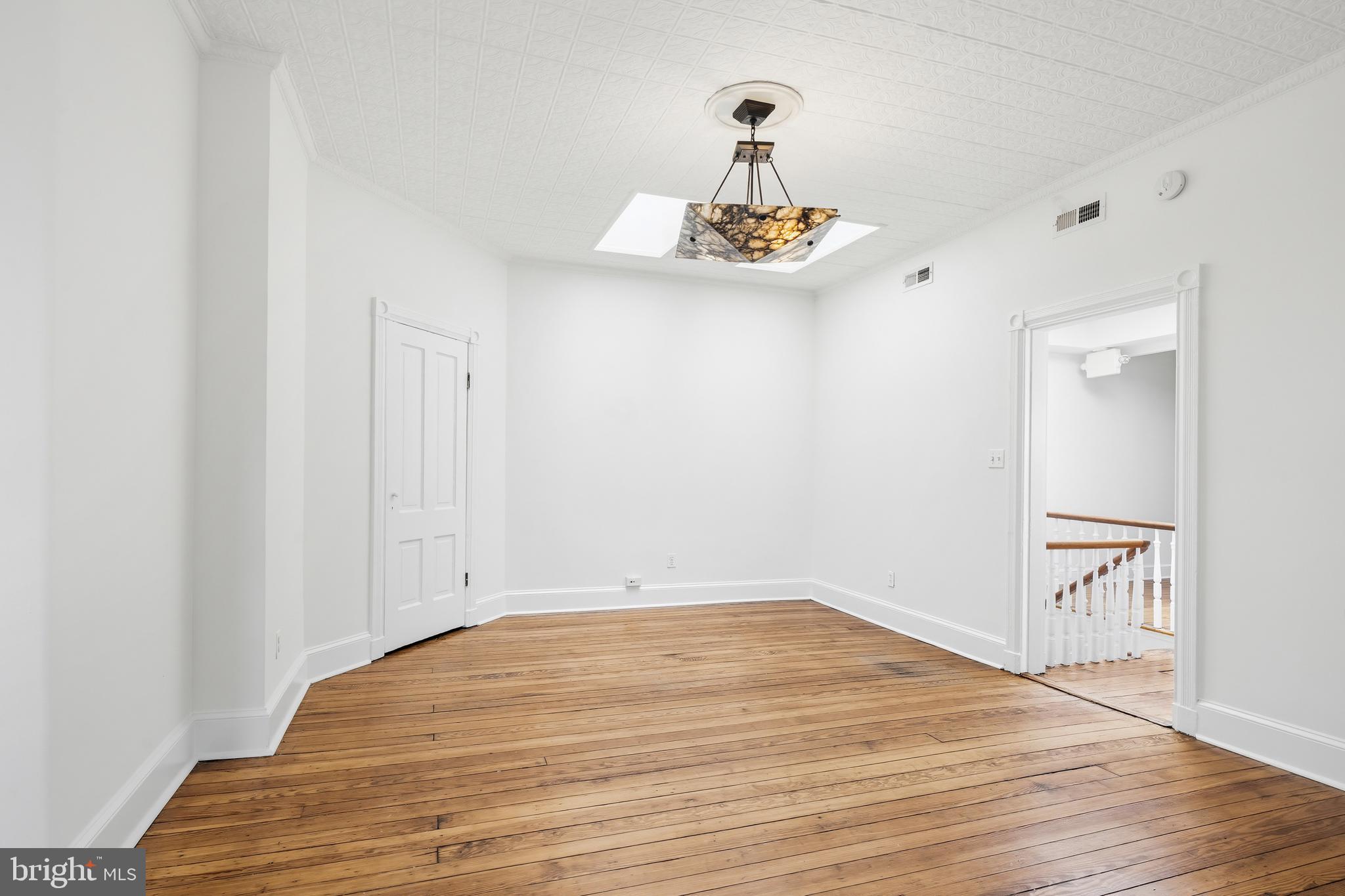 400 7th Street Southeast Washington, DC 20003 - Photo 18 of 23 a view of empty room with wooden floor