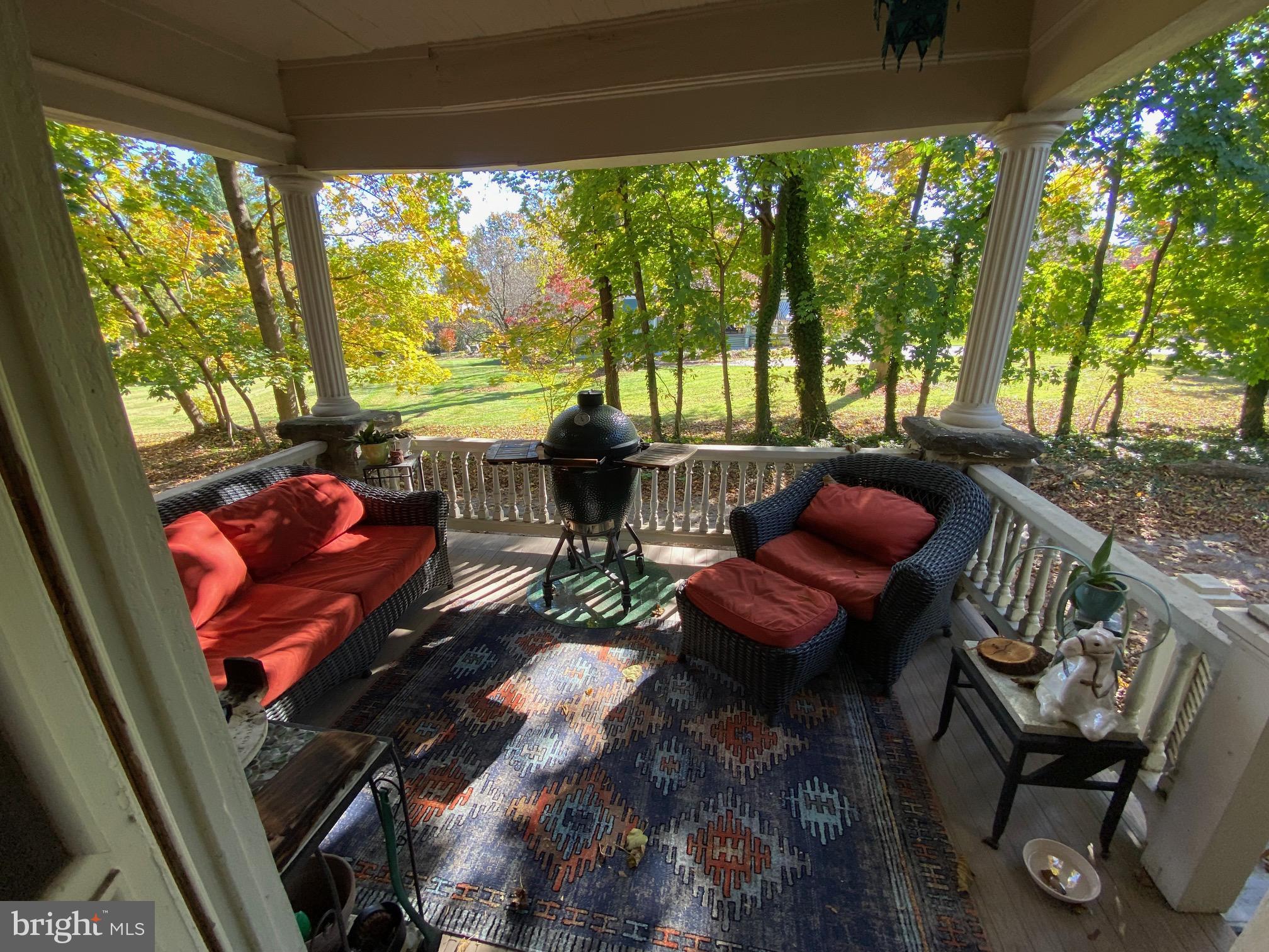5713 Roland Avenue Baltimore, MD 21210 - Photo 21 of 29 a outdoor living space with patio furniture and a potted plants