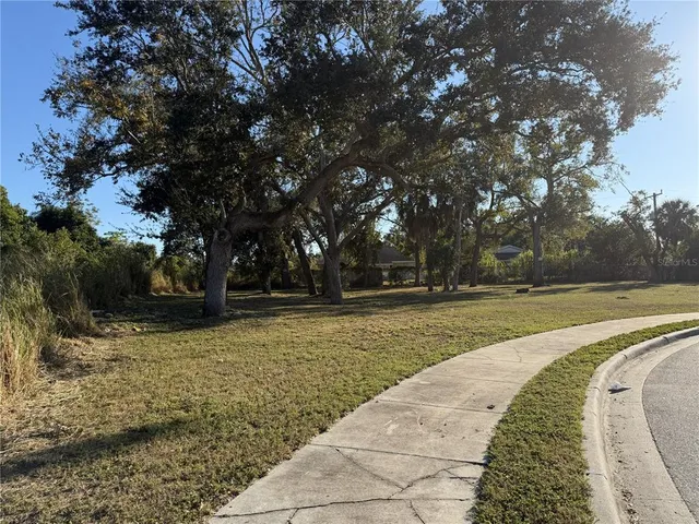 a view of swimming pool with trees