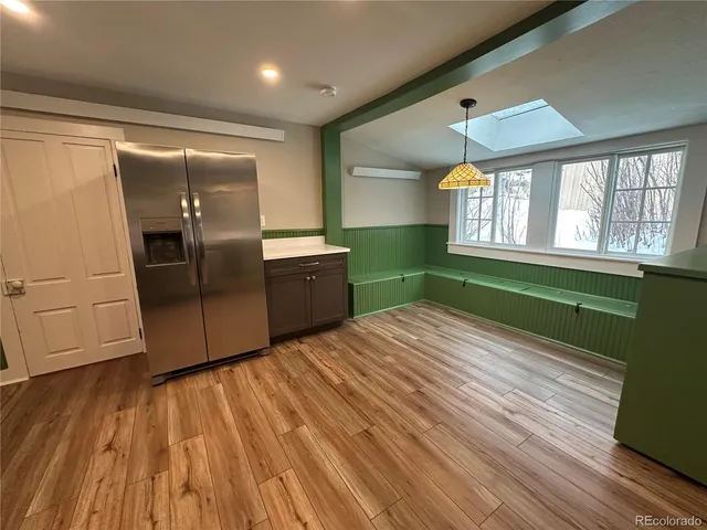 a room with window and wooden floor