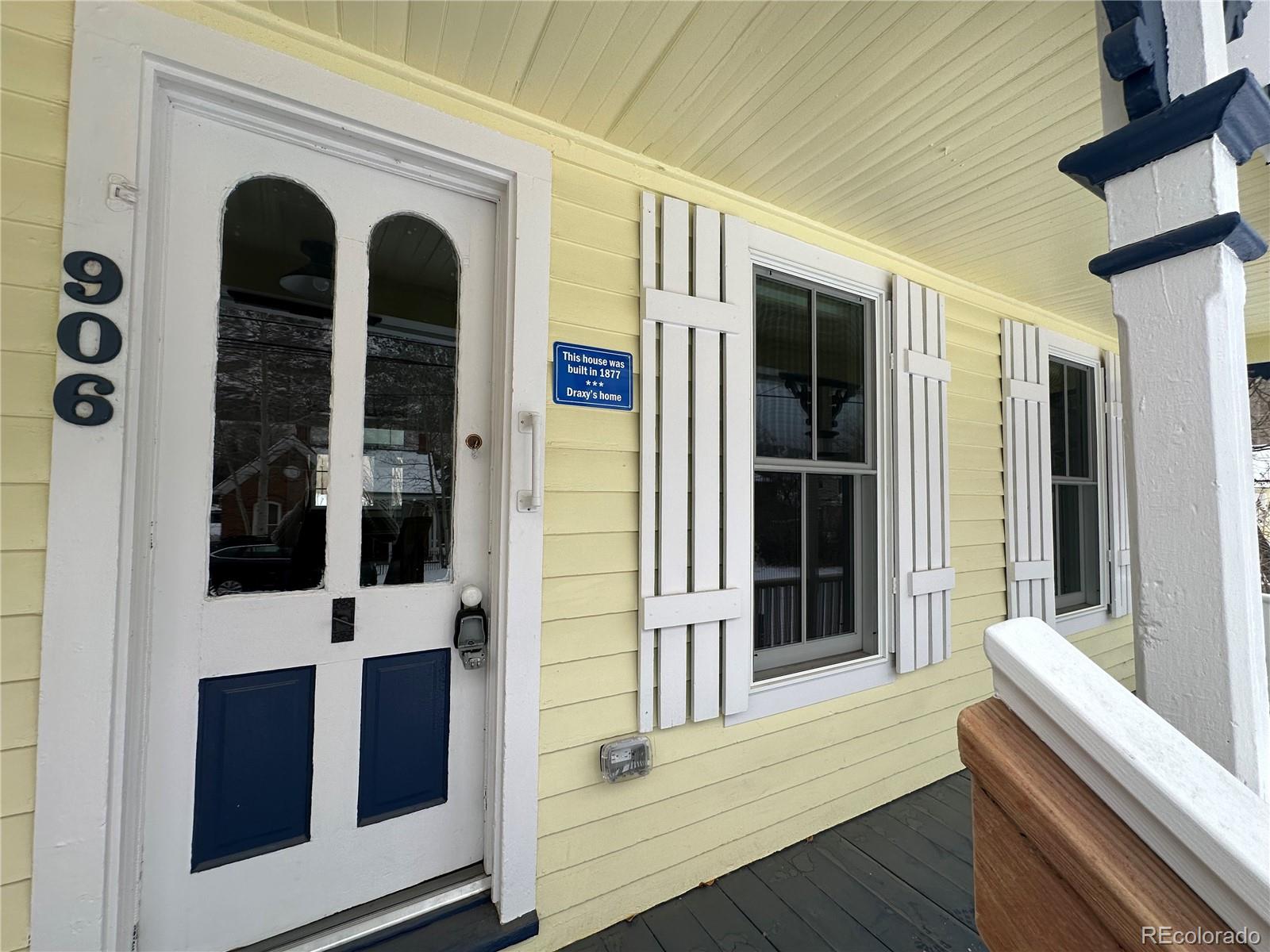 906 Main Street Georgetown, CO 80444 - Photo 2 of 28 a view of front door of house with stairs
