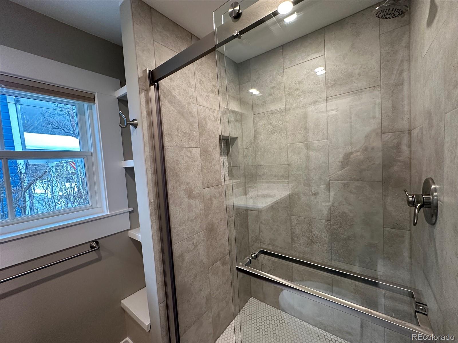 906 Main Street Georgetown, CO 80444 - Photo 21 of 28 a bathroom with a shower