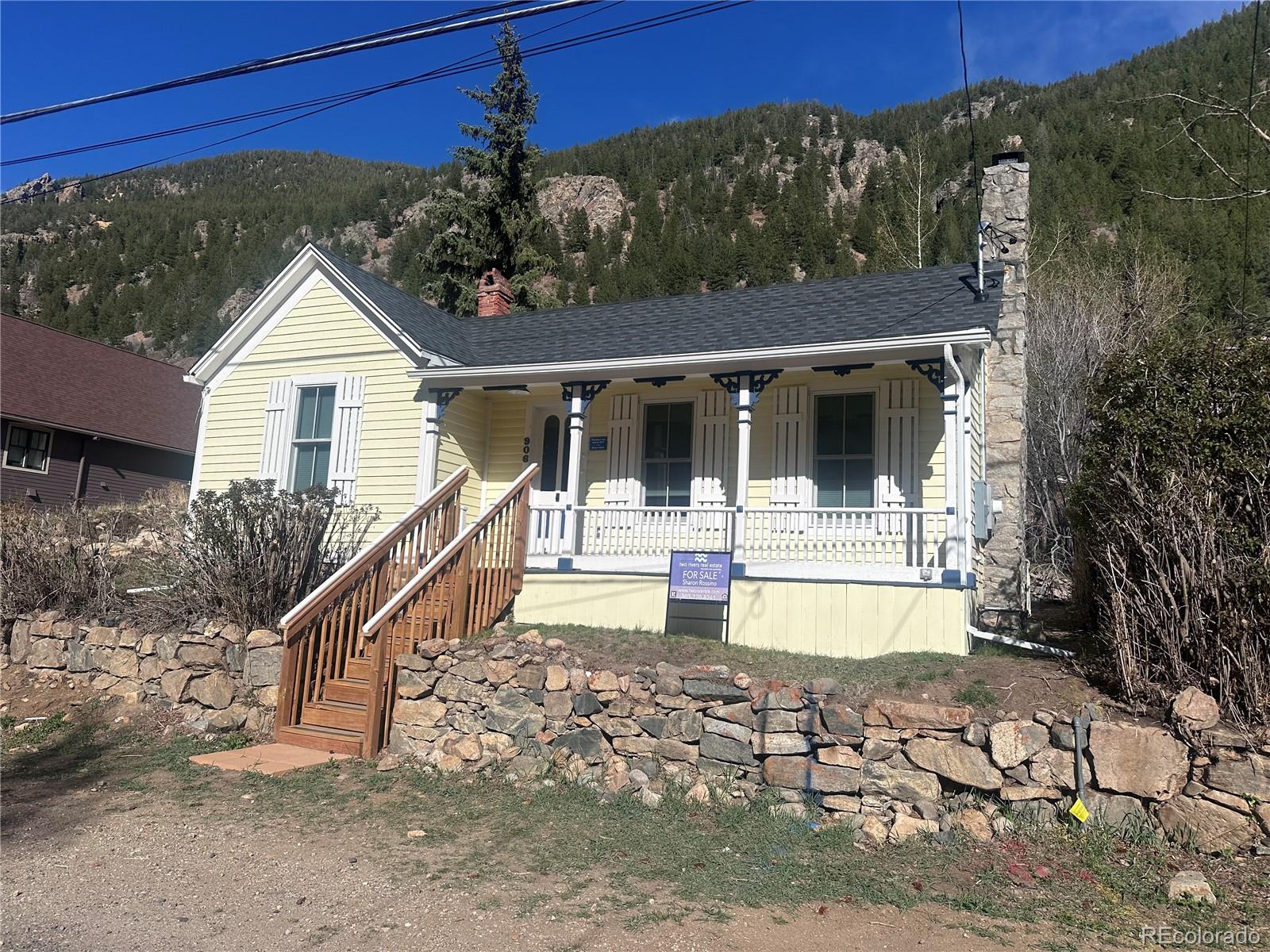 906 Main Street Georgetown, CO 80444 - Photo 26 of 26 a view of a house with pool and sitting area