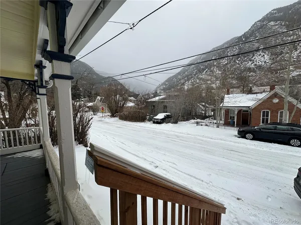 a outdoor view of a house with a street