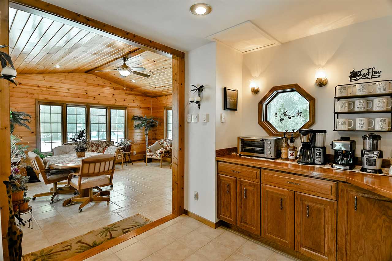 12944 Huntsboro Lane Roscoe, IL 61073 - Photo 9 of 40 a very nice looking living room with a large window