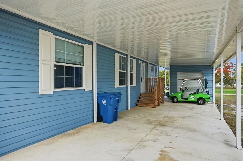 9100 Highpoint Boulevard Brooksville, FL 34613 - Photo 2 of 42 a view of a house with backyard and garden