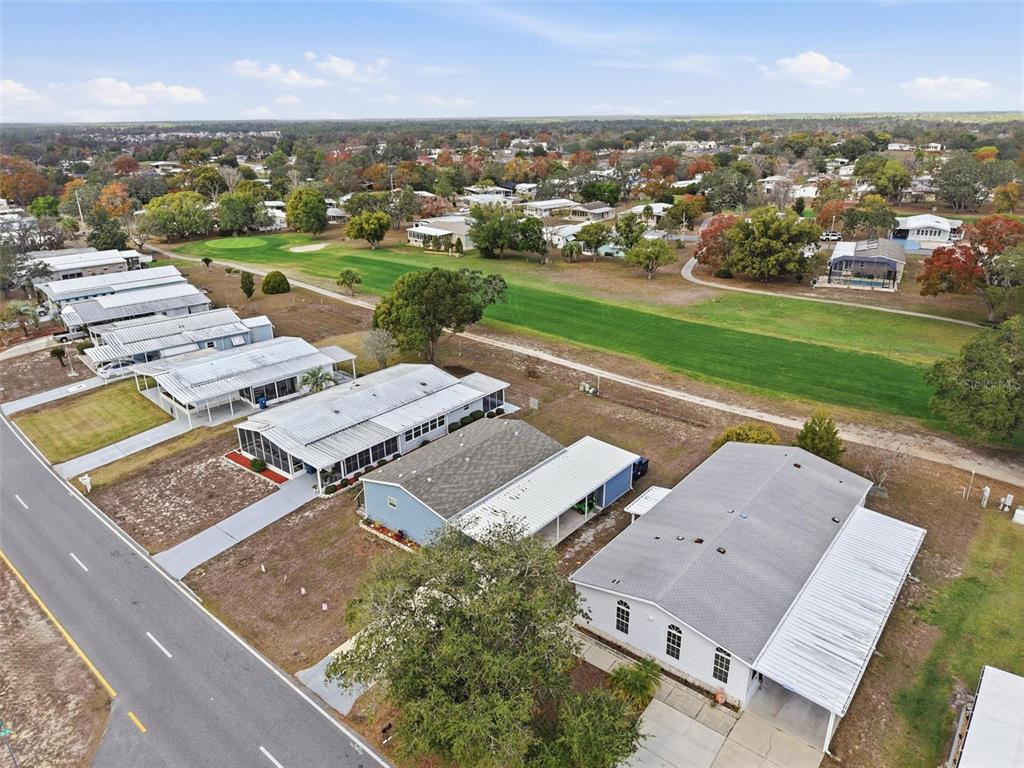 9100 Highpoint Boulevard Brooksville, FL 34613 - Photo 25 of 42 an aerial view of a house with a garden