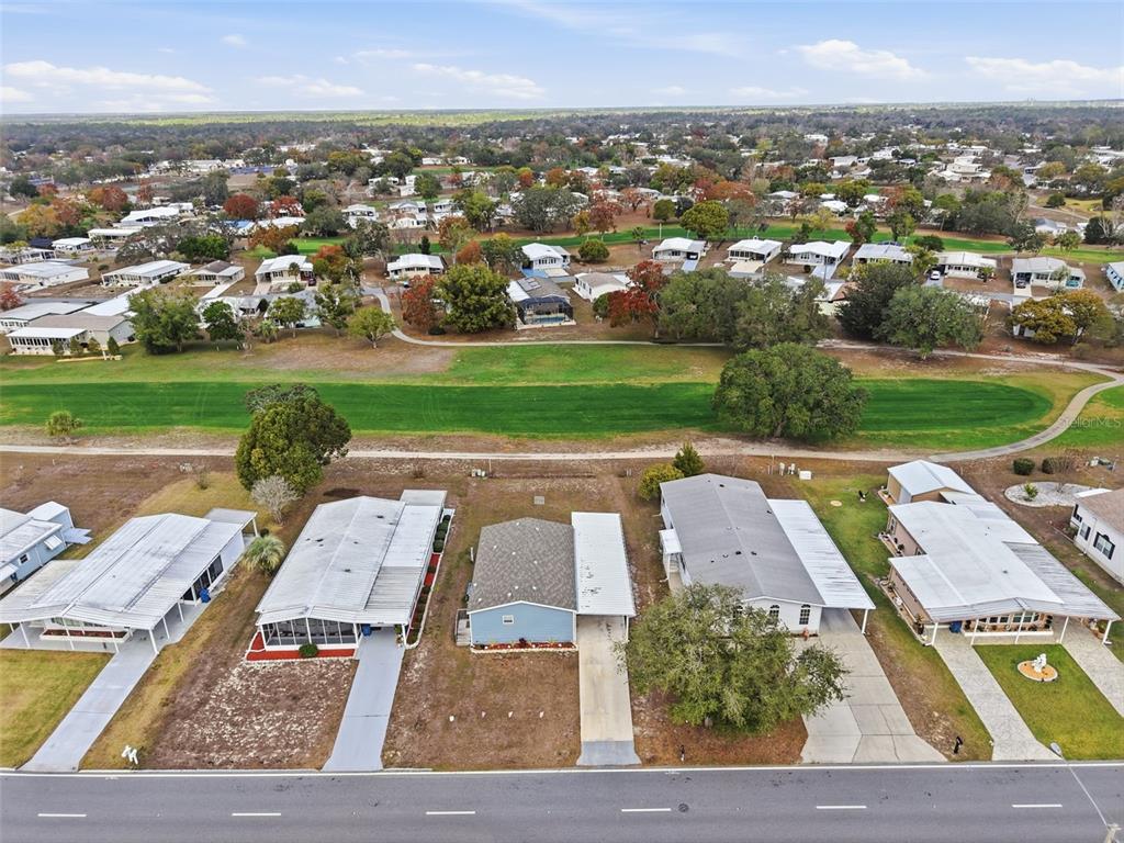 9100 Highpoint Boulevard Brooksville, FL 34613 - Photo 26 of 42 an aerial view of a house with a big yard